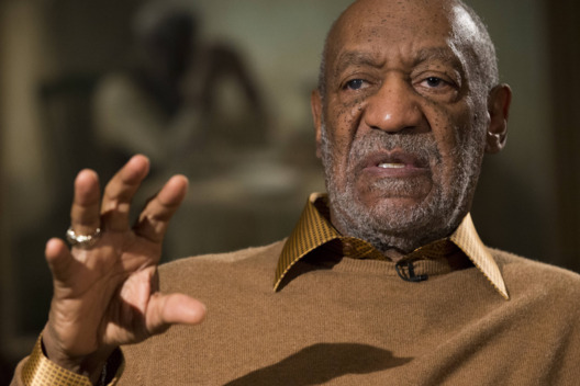Entertainer Bill Cosby gestures during an interview about the upcoming exhibit, Conversations: African and African-American Artworks in Dialogue, at the Smithsonian's National Museum of African Art, on Thursday, Nov. 6, 2014, in Washington. After amassing a private collection of African-American Art over four decades, Bill Cosby and his wife Camille plan to showcase their holdings for the first time in an exhibition planned at the Smithsonian Institution. The collection, which will be loaned to the museum, includes works by such leading African-American artists as Beauford Delaney, Faith Ringgold, Jacob Lawrence, Augusta Savage and Henry Ossawa Tanner. (AP Photo/Evan Vucci)