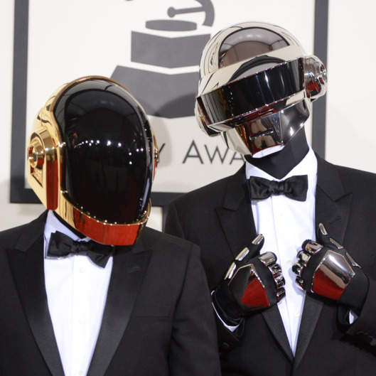 Nominee For Best Album Of The Year "Random Access Memories" Daft Punk arrive on the red carpet for the 56th Grammy Awards at the Staples Center in Los Angeles, California, January 26, 2014.