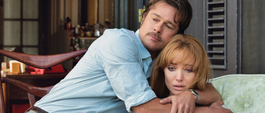 Roland (BRAD PITT) and Vanessa (ANGELINA JOLIE PITT) embrace in By the Sea, a dramatic film from director Jolie Pitt that follows an American writer and his wife who arrive in a tranquil and picturesque seaside resort in 1970s France, their marriage in apparent crisis.