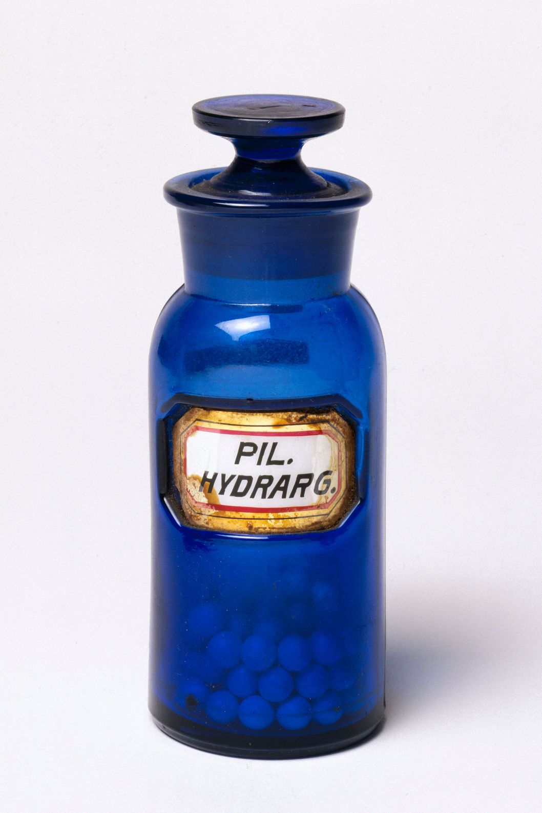 image of old blue mercury bottle