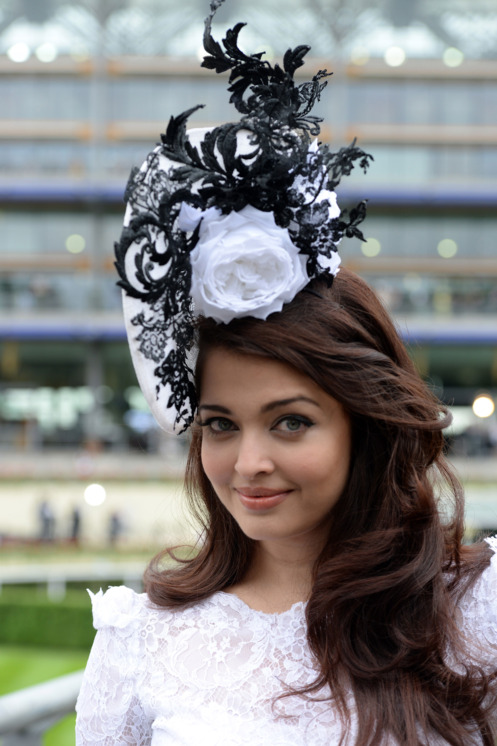 http://pixel.nymag.com/imgs/fashion/slideshows/2013/06/royal-ascot-hats/170801235_10.nocrop.w624.h746.jpg
