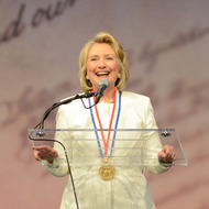 PHILADELPHIA, PA - SEPTEMBER 10: Former Secretary of State Hillary Rodham Clinton makes remarks after receiving the 2013 Liberty Medal at the National Constitution Center September 10, 2013 in Philadelphia, Pennsylvania. The Liberty Medal was established in 1988 to commemorate the bicentennial of the U.S. Constitution. Given annually, the medal aims to recognize leadership in the pursuit of freedom. (Photo by William Thomas Cain/Getty Images)