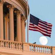 The American flag flies at half-staff over the U.S. Capitol at sunset following the shooting at the Washington Navy Yard, Monday, Sept. 16, 2013, in Washington. (AP Photo/J. Scott Applewhite)