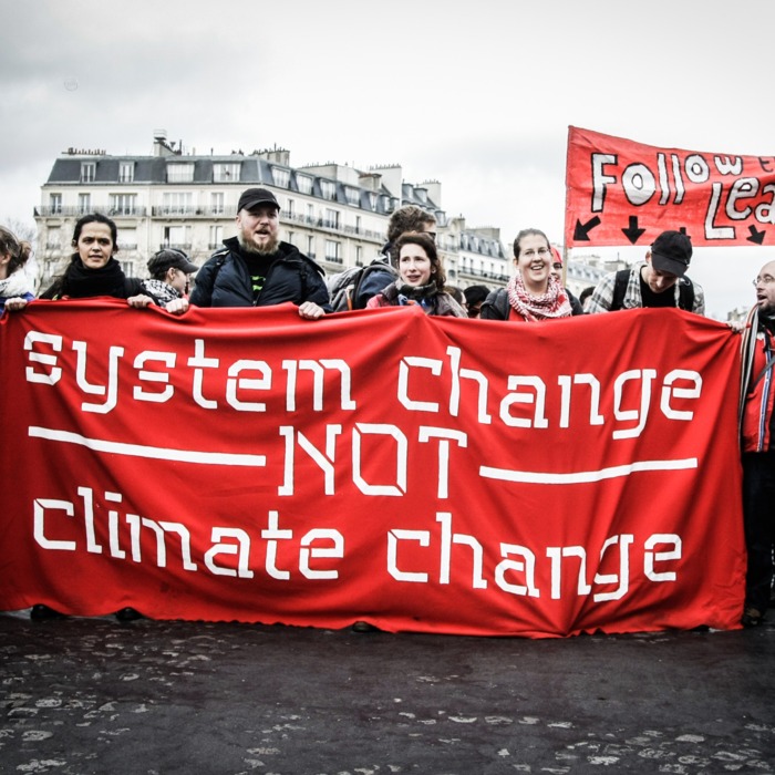 Thousands of people on a march for global climate justice in Paris