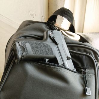 Image result for gun in backpack