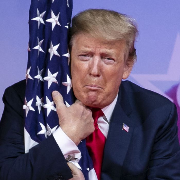02-CPAC-Trump-Hugs-Flag.w700.h700.jpg
