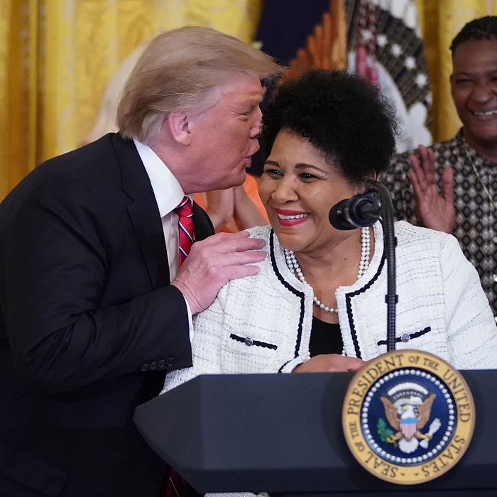 U.S. President Donald Trump (L) asks Alice Marie Johnson, "Are you sure?" after she thanked the press during a celebration of the First Step Act in the East Room of the White House April 01, 2019 in Washington, DC.