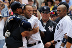 NEW YORK, NY - JULY 09: Derek Jeter #2 of the New York Yankees celebrates at home with teammates Alex Rodriguez #13, Bartolo Colon #40 and Andruw Jones #18 after hitting a solo home run in the third inning for career hit 3000 while playing against the Tampa Bay Rays at Yankee Stadium on July 9, 2011 in the Bronx borough of New York City. (Photo by Michael Heiman/Getty Images)
