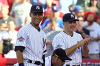 Derek Jeter and Manager Joe Girardi of the New York Yankees during the 81st MLB All-Star Game at Angel Stadium.