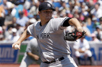 Phil Hughes throws a pitch against the Toronto Blue Jays.