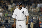 NEW YORK, NY - JULY 26: CC Sabathia #52 of the New York Yankees walks off the field after the seventh inning against the Seattle Mariners on July 26, 2011 at Yankee Stadium in the Bronx borough of New York City. (Photo by Jim McIsaac/Getty Images)