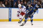 David Perron (57) of the St. Louis Blues breaks loose with the puck during the NHL regular season game between The New York Rangers vs The St. Louis Blues at Scott Trade Center in St. Louis MO. (Cal Sport Media via AP Images)