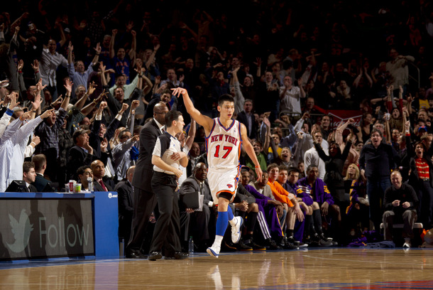 Jeremy Lin #17 of the New York Knicks reacts to the crowd after hitting a three point shot during the game against the Los Angeles Lakers on February 10, 2012 at Madison Square Garden in New York City.