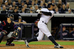 Curtis Granderson #14 of the New York Yankees hits a two run homer in the second inning against the Minnesota Twins on April 19, 2012 at Yankee Stadium in the Bronx borough of New York City.