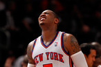 Carmelo Anthony #7 of the New York Knicks reacts in the second half against the Miami Heat in Game Three of the Eastern Conference Quarterfinals in the 2012 NBA Playoffs on May 3, 2012 at Madison Square Garden in New York City.