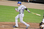 Josh Hamilton #10 of the Texas Rangers hits a home run in the eighth inning during a baseball game against the Baltimore Orioles at Oriole Park at Camden Yards on May 8, 2012 in Baltimore, Maryland.