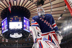 NEW YORK, NY - MAY 16: Henrik Lundqvist #30 of the New York Rangers retrieves the puck from the net after David Clarkson #23 of the New Jersey Devils scored a third period goal in Game Two of the Eastern Conference Final during the 2012 NHL Stanley Cup Playoffs at Madison Square Garden on May 16, 2012 in New York City. (Photo by Bruce Bennett/Getty Images)