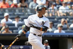 NEW YORK, NY - JULY 01: Robinson Cano #24 of the New York Yankees follows through on his third inning two-run home run against the Chicago White Sox at Yankee Stadium on July 1, 2012 in the Bronx borough of New York City. (Photo by Jim McIsaac/Getty Images)