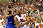 Kevin Durant #5 of the US Men's Senior National Team drives to the basket during a game against Serge Ibaka #14 of the Spanish Men's Senior National Team at Palau Sant Jordi on July 24, 2012