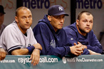 Infielder Derek Jeter #2 (left), pitcher Andy Pettitte #46 and pitcher Joba Chamberlain #62 of the New York Yankees watch the end of the game against the Tampa Bay Rays at Tropicana Field on September 4, 2012 in St. Petersburg, Florida.