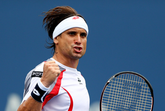 David Ferrer of Spain celebrates a point against Janko Tipsarevic of Serbia during their men's singles quarterfinal match Day Eleven of the 2012 US Open at USTA Billie Jean King National Tennis Center on September 6, 2012 in the Flushing neighborhood of the Queens borough of New York City.