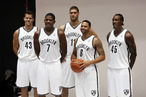 Brooklyn Nets Kris Humphries, Joe Johnson, Brook Lopez, Deron Williams, and Gerald Wallace, left to right, pose for photos during Brooklyn Nets basketball media day, in the Brooklyn borough of New York, Monday, Oct. 1, 2012.