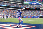 Victor Cruz #80 of the New York Giants scores his second touchdown against the Cleveland Browns during their game at MetLife Stadium on October 7, 2012 in East Rutherford, New Jersey.