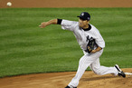 Hiroki Kuroda #18 of the New York Yankees pitches during Game Three of the American League Division Series against the Baltimore Orioles at Yankee Stadium on October 10, 2012 in the Bronx borough of New York City.