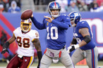 New York Giants Eli Manning gets set to throw a pass in the third quarter against the Washington Redskins in week 15 of the NFL season at MetLife Stadium in East Rutherford, New Jersey on December 18, 2011