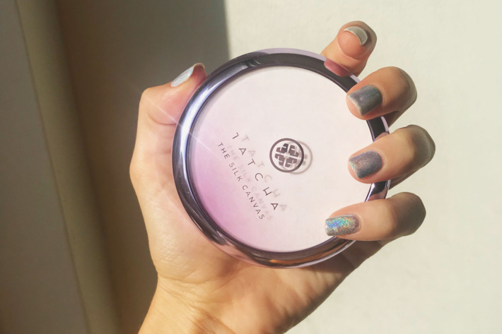 Rio Viera Newton holding her new Tatcha primer in her hand.