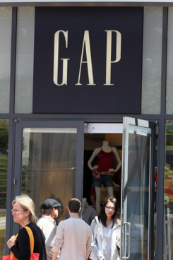 SAN FRANCISCO, CA - MAY 19: Pedestrians walk by a Gap store on May 19, 2011 in San Francisco, California. Clothing retailer Gap Inc. will announce first quarter earnings today after the stock market close. (Photo by Justin Sullivan/Getty Images)