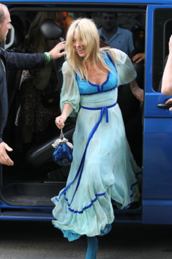 This is Kate getting out of the car to have drinks with her bridal party today. No, we don't know what's up with the dress. Do you?