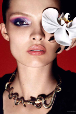 Carola Remer, and a big white flower.