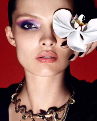 Carola Remer, and a big white flower.