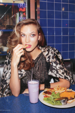 Karlie Kloss, apparently not really enjoying her fry.