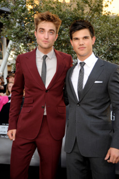 Robert Pattinson & Taylor Lautner. Robert is quite possibly crying inside a little.
