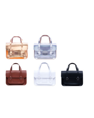 Comme des Garçons x Cambridge Satchel Company.