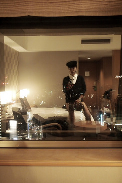 Bryanboy and a strategically placed purse.