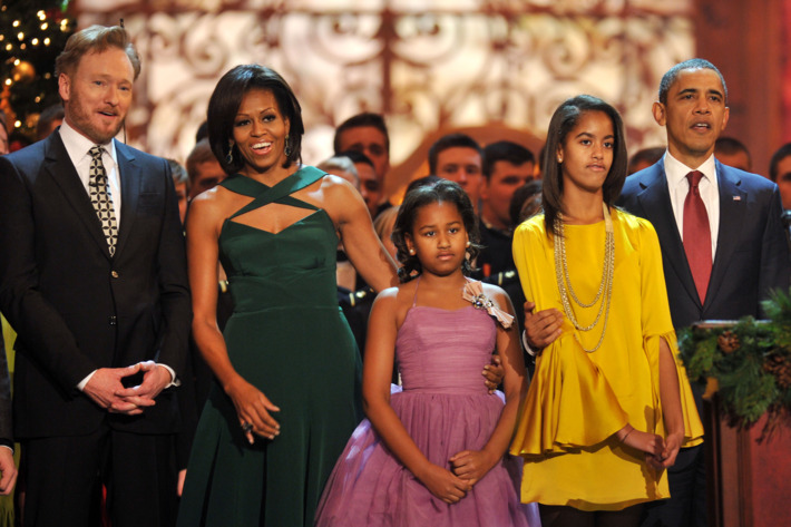 The Obamas with the event's host, Conan O'Brien.