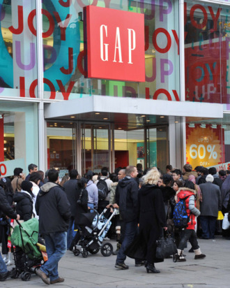 LONDON, UNITED KINGDOM - DECEMBER 26: Eager shoppers descend on stores on Oxford Street for the Boxing Day sales on December 26, 2011 in London, England. Dubbed