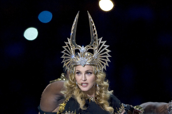 Madonna performs at the 2011 Super Bowl Halftime show.