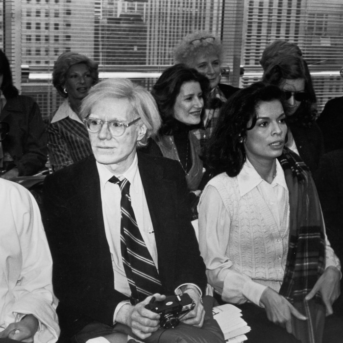French Vogue editor Françoise de la Renta (nee de Langlade, 1931 - 1983) (left), pop artist Andy Warhol (1928 - 1987) (second left), model Bianca Jagger (second right), and nightclub owner and businessman Steve Rubell (1943 - 1989) attend a fashion show by designer Halston, New York, New York, April 27, 1978. (Photo by Fred W. McDarrah/Getty Images)