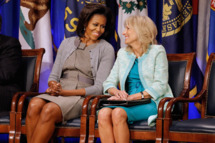 U.S. first lady Michelle Obama (L) and Dr. Jill Biden attend an event to announce a new report regarding military spouse employment at the Pentagon February 15, 2012 in Arlington, Virginia. The report, "Supporting our Military Families: Best Practices for Streamlining Occupational Licensing Across State Lines," says that military families face a greater financial burden when moving from state to state due to licensing and credentials costs. Obama, Biden and military officials pledged to work to reduce this burden.