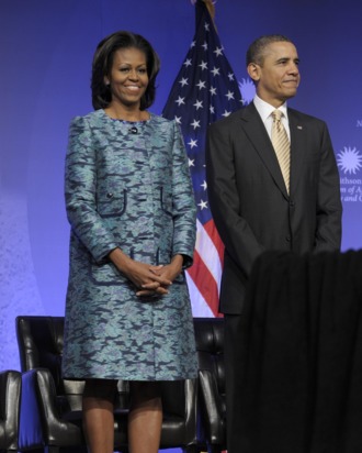 President Barack Obama and first lady Michelle Obama arrive to attend a groundbreaking ceremony at the construction site of the Smithsonian National Museum of African American History and Culture in Washington, Wednesday, Feb. 22, 2012.