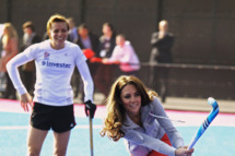 Women's Team GB hockey captain Kate Walsh watches Catherine, Duchess of Cambridge play hockey with the GB hockey teams at the Riverside Arena in the Olympic Park on March 15, 2012 in London, England. The Duchess of Cambridge viewed the Olympic park as well as meeting members of the men's and women's GB Hockey teams.