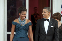 U.S. President Barack Obama, right, and first lady Michelle Obama walk to greet David Cameron, U.K. prime minister, and his wife Samantha Cameron on the North Portico of the White House in Washington, D.C., U.S., on Wednesday, March 14, 2012. Obama and Cameron showed a united front on finishing the war in Afghanistan and pressing for change in Iran and Syria, seeking to consolidate international support before a North Atlantic Treaty Organization meeting in May.