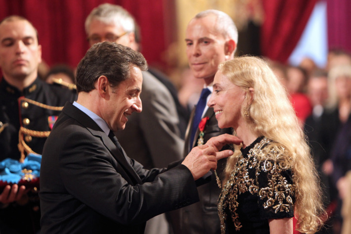 Nicolas Sarkozy awards Franca Sozzani the Legion of Honor.