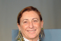 Italian designer Miuccia Prada poses during a press conference announcing the 'Schiaparelli and Prada: Impossible Conversations' exhibition on February 24, 2012 during the Women's fashion week in Milan. The exhibition, curated by Harold Koda and Andrew Bolton and sponsored by the Conde Nast publishing group, running at the New York Metropolitan museum of art from May 10 to August 19, 2012 will feature iconic costumes and approximately 90 designs and 30 accessories by Italian designers Elsa Schiaparelli (1890–1973) from the late 1920s to the early 1950s, and by Miuccia Prada from the late 1980s to the present.