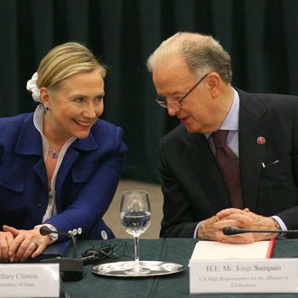 US Secretary Of State Hillary Clinton (L) listens to Portugal's former president and UN High Representative Jorge Sampaio as they take part in the Community Of Democracies ministerial conference in Vilnius on July 1, 2011. The Community of Democracies, an informal grouping of more than a hundred countries set up in 2000 to help cement freedoms worldwide, kicked off a two-day conference in the Baltic state of Lithuania yesterday. AFP PHOTO / PETRAS MALUKAS (Photo credit should read PETRAS MALUKAS/AFP/Getty Images)