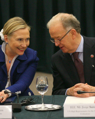 US Secretary Of State Hillary Clinton (L) listens to Portugal's former president and UN High Representative Jorge Sampaio as they take part in the Community Of Democracies ministerial conference in Vilnius on July 1, 2011. The Community of Democracies, an informal grouping of more than a hundred countries set up in 2000 to help cement freedoms worldwide, kicked off a two-day conference in the Baltic state of Lithuania yesterday. AFP PHOTO / PETRAS MALUKAS (Photo credit should read PETRAS MALUKAS/AFP/Getty Images)